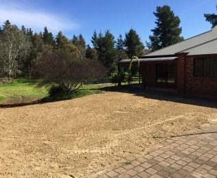 bobcat hire yard makeover and resurfacing with rubble base ready for new landscaping