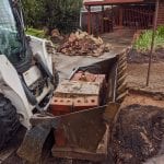 bobcat hire removing old pavers and driveway at Hillbank